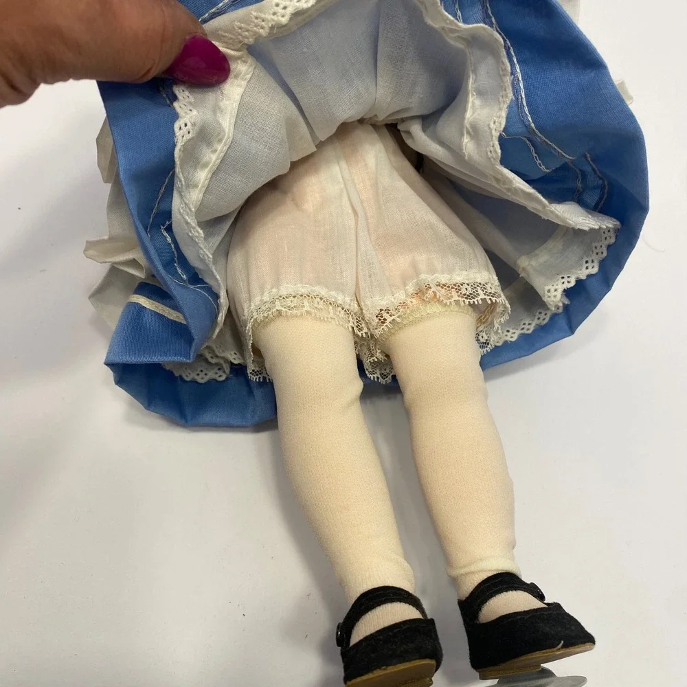 Madame Alexander white neat trimmed